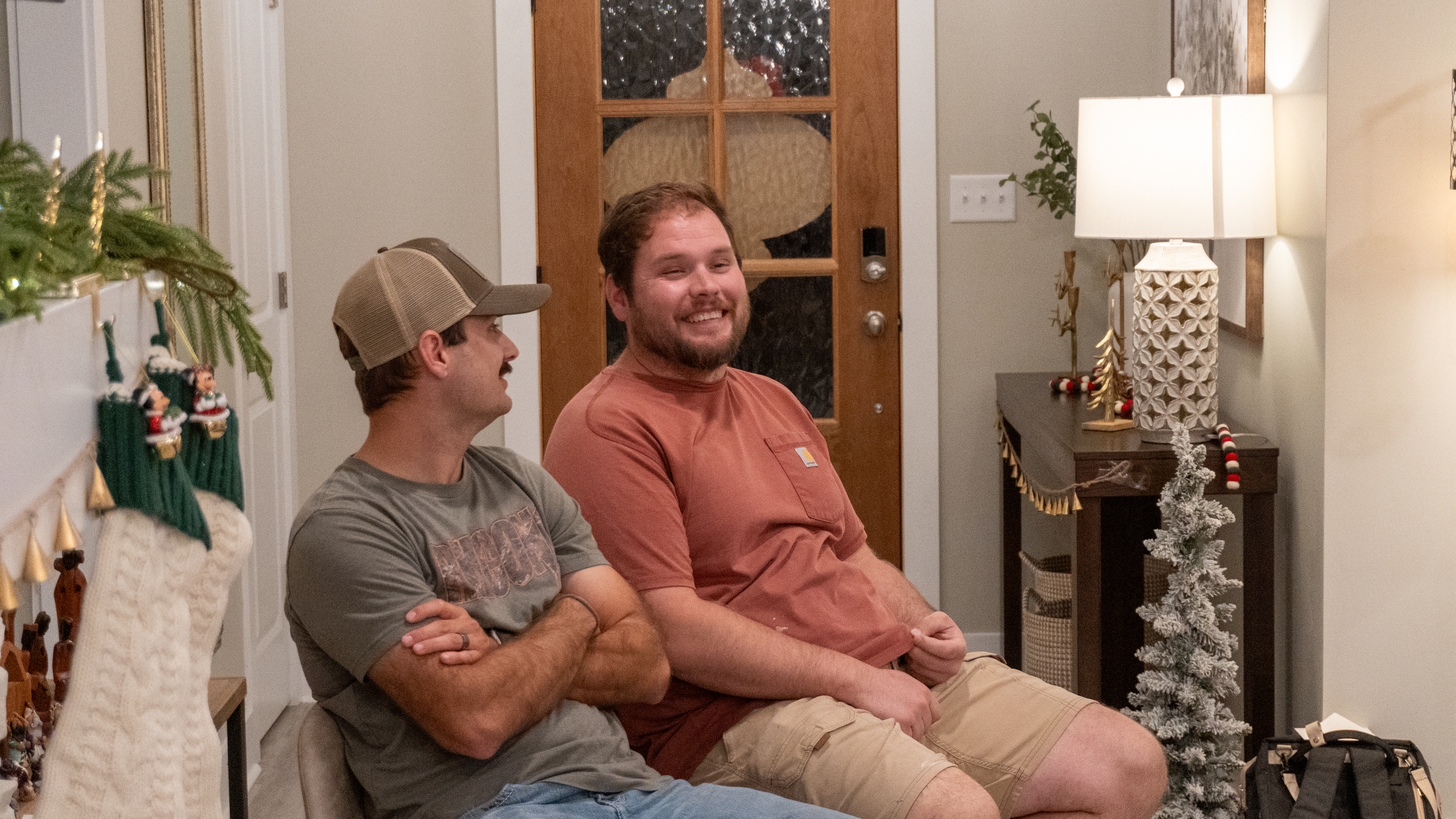 Michael Mann (left) and Patrick Patterson (right) laugh during conversation. 